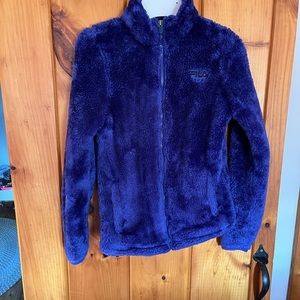 Little girl zip up furry jacket.